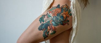 Красива татуировка на бедрото
