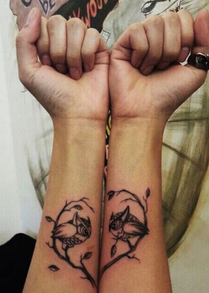Tatuaggio di gufi in coppia