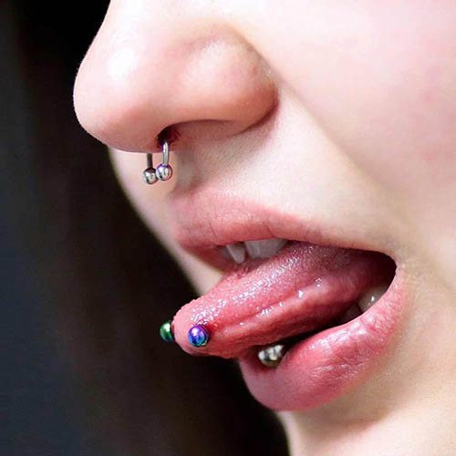 Tongue Piercing stang. Foto, hvordan man vælger, størrelsen af ornamentet, pleje