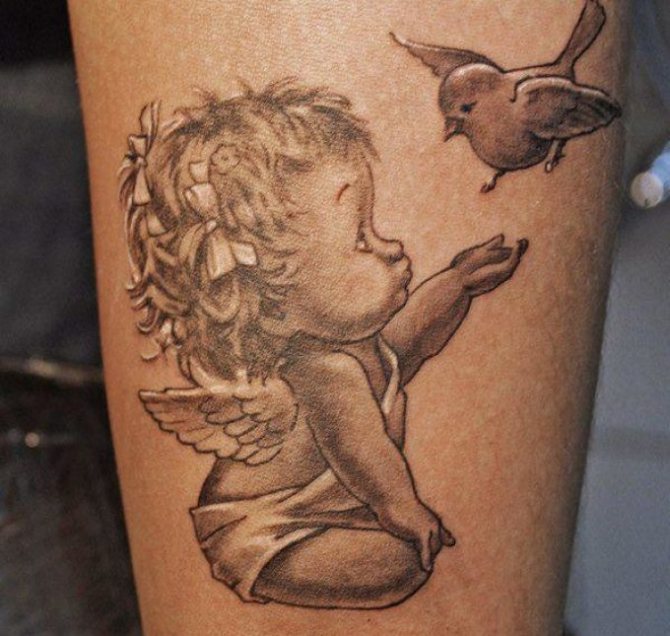 Fantastiske engle - tatovering på arm