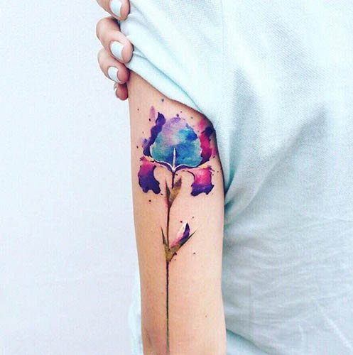 Tatuaje moderne pentru fete pe braț. Schițe, semnificație, fotografie