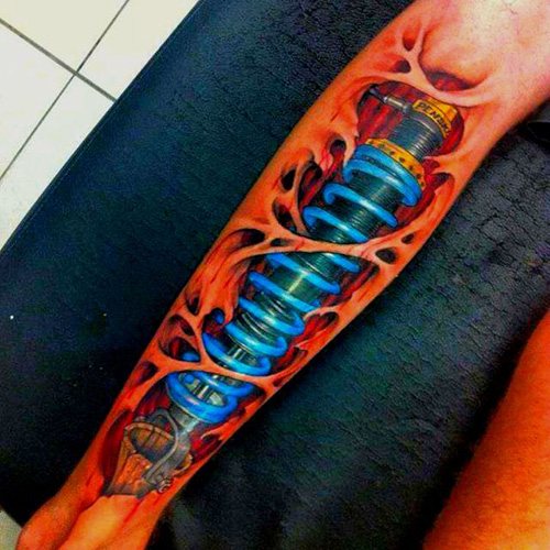 Tattoo schokdemper op het been. Foto, betekenis, schetsen