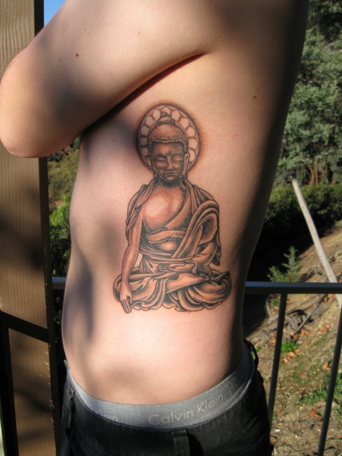 Tattoo Boeddha tegen het boze oog