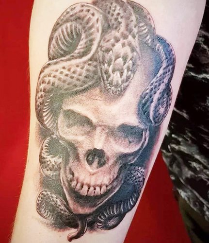 Skull Tattoo. What it means for men, girls, sketches on the hand, arm, shoulder, forearm