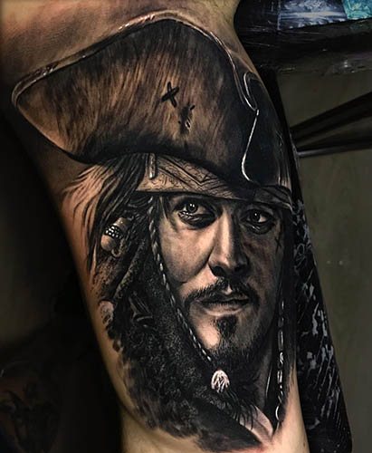 Jack Sparrow tatuiruotė ant rankos, nugaros, peties. Nuotrauka, reikšmės
