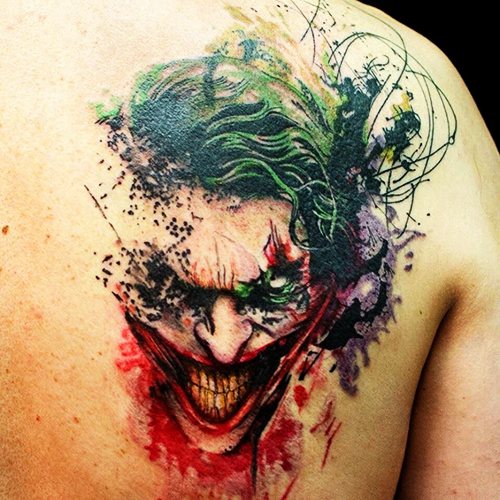 Joker-tätoveering käel, küünarvarre, jalal. Sketšid, foto, tähendus