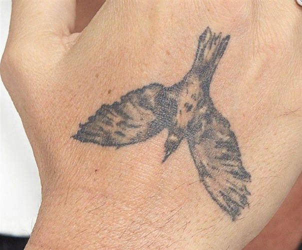 Johnny Depp tetoválás. Képek a karján, hátán és kezén