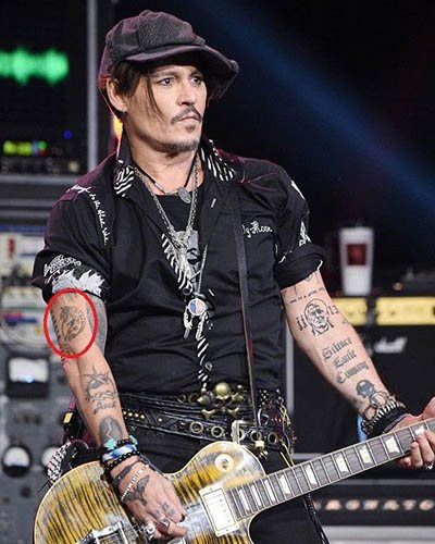 Tatovering af Johnny Depp. Billeder på hans arm, ryg, hånd