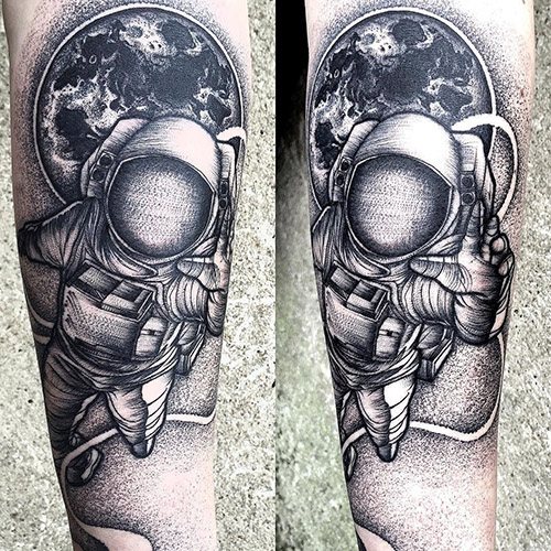 Tatuaggio Astronauta sul braccio. Schizzi, significato, foto