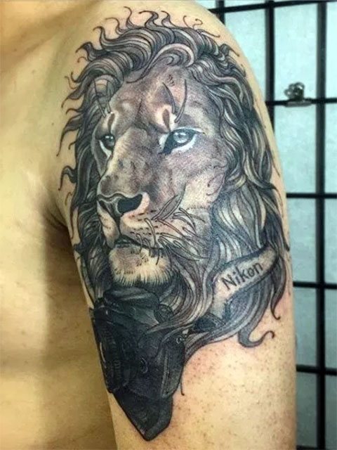 Tattoo lion on hand for men