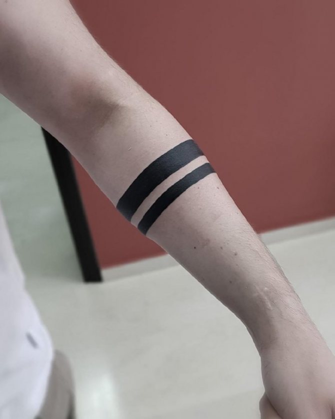 tattoo strepen rond hand betekenis