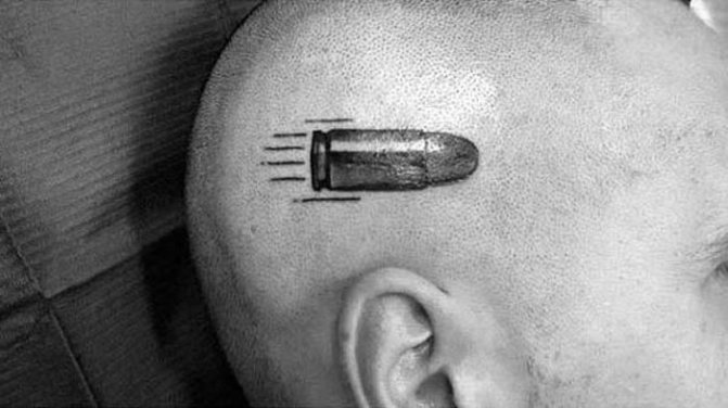 tatuagem de uma bala na sua cabeça