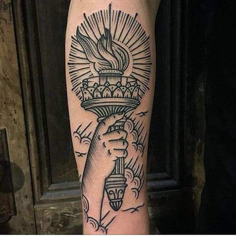 Tattoo with a torch