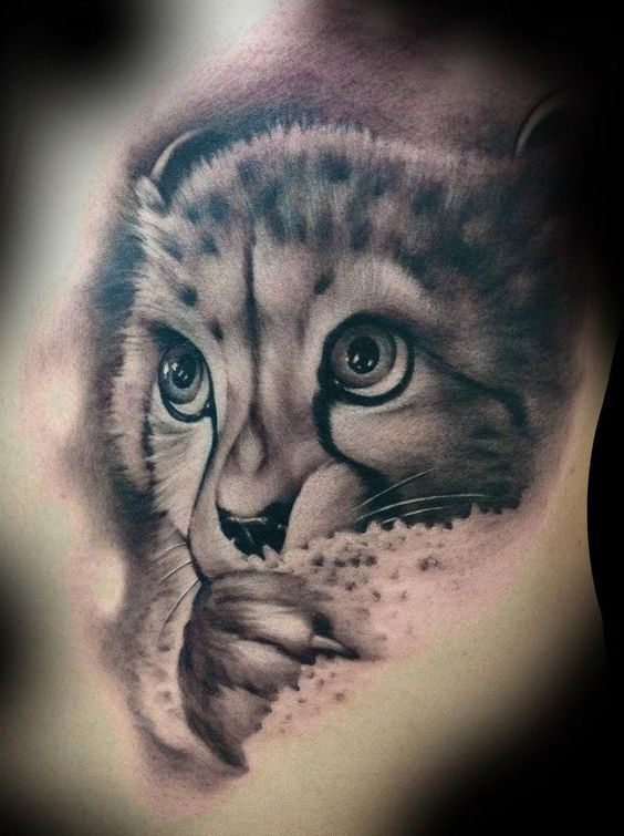 Tatuaggio del bambino ghepardo