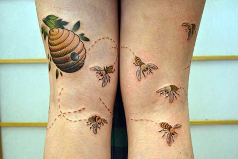 Μέλισσα τατουάζ και κυψέλη