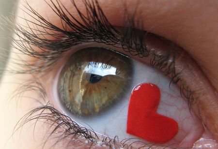 Tattoo of a heart on the eyeball