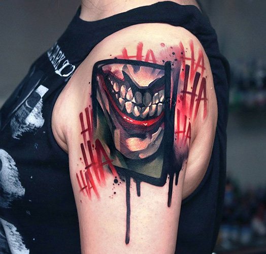 Tatuaj Joker Smile pe brațul său. Schițe, fotografie