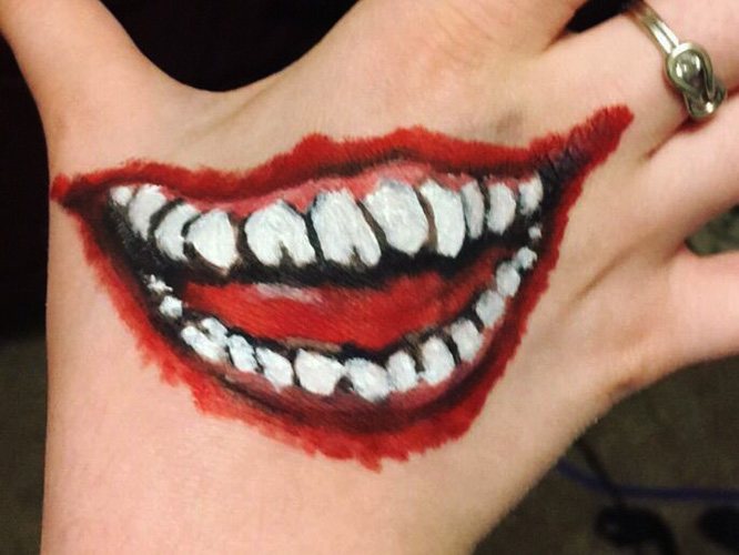Tetovanie Joker Smile na ruke. Náčrty, fotografie