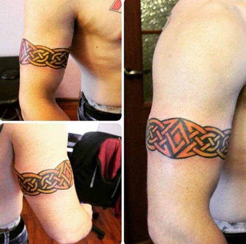 Tatuaggio intorno al bicipite maschio, femmina. Foto: in stile slavo, il modello scita, nodi celtici