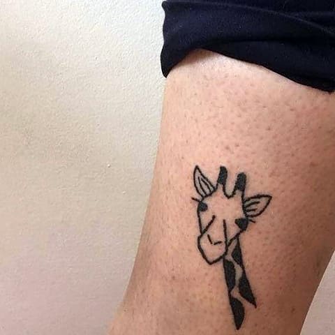 Tatoeage van een giraffe