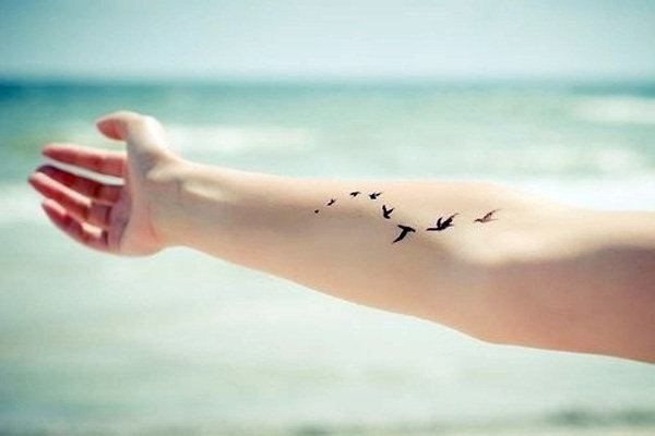 Tatuaje pentru fete pe braț și semnificația lor. Fotografii, desene, frumoase, mici, inscripții