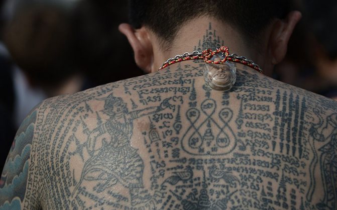 Sak Yant tatuiruotės: istorija, reikšmė, technologija, meistrai