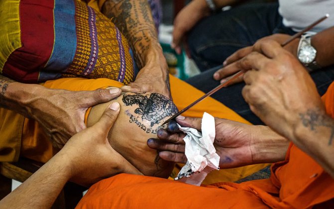 Sak Yant tatoveringer: historie, betydning, teknologi, mestre