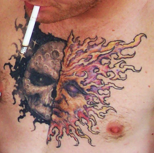 Slipknot énekes tetoválása: Nap és Hold