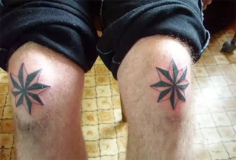 Trestné tetovanie veternej ruže na kolenách