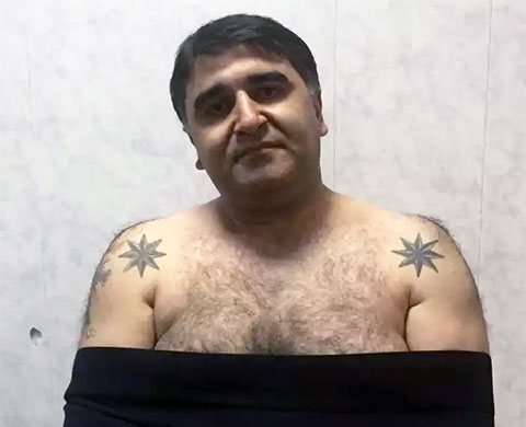 Zločinecký boss Nodar Aloyan - Nodar Tbilisi s väzenským tetovaním veternej ruže
