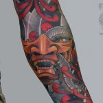Merkitys tatuointi demonin naamio